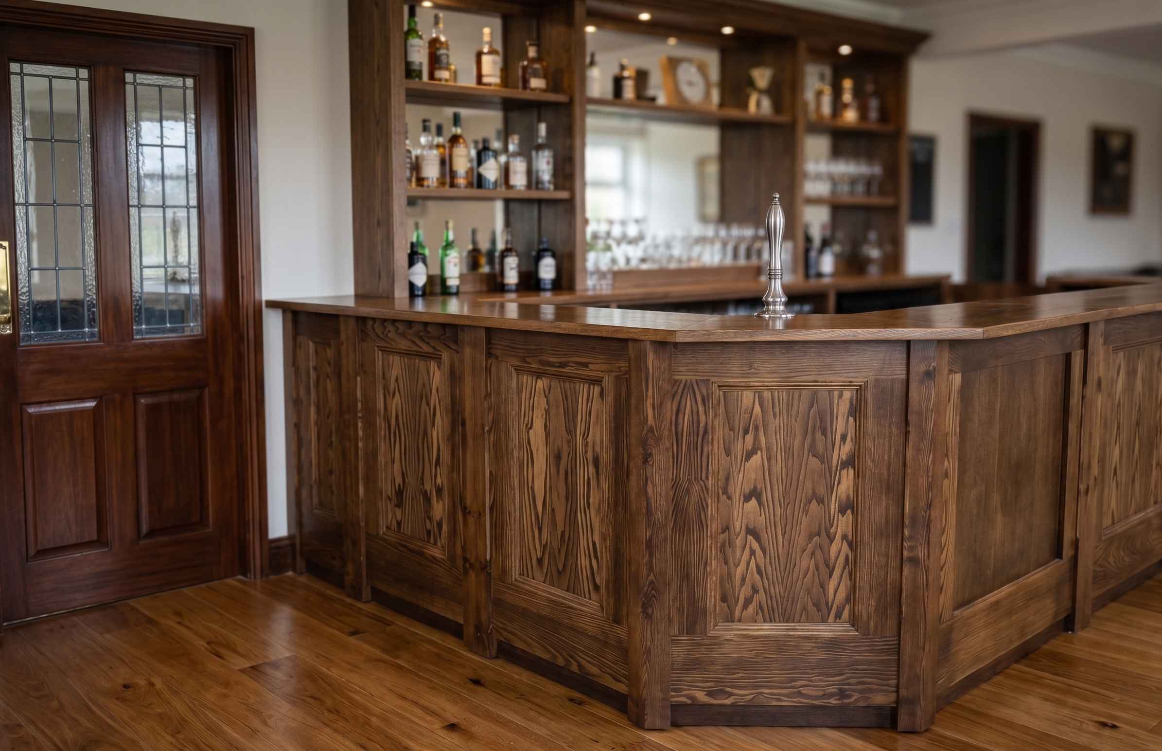 Bespoke handcrafted oak home bar with backlit spirits display