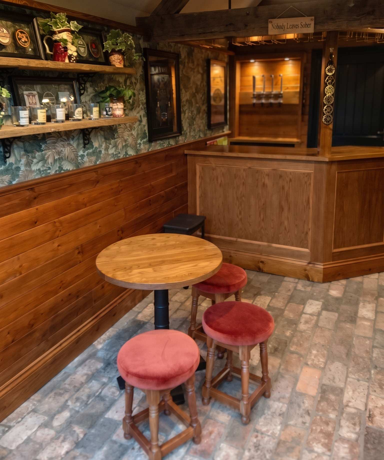 Integrated drinks cabinet and pocket-door cocktail bar