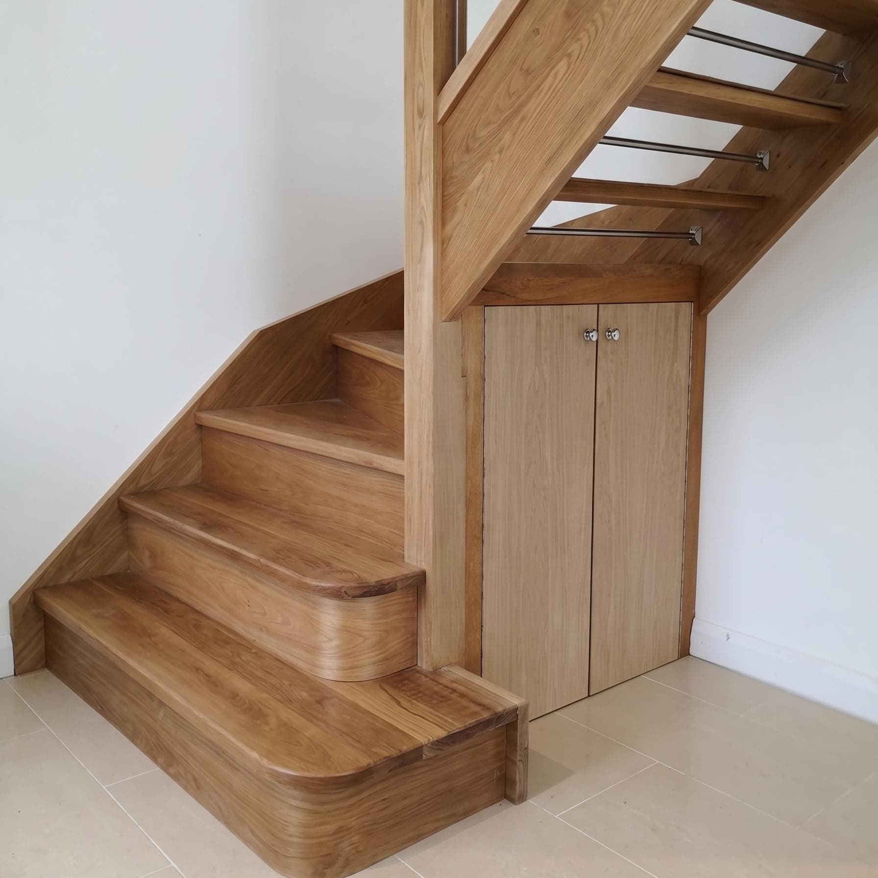 Premium under-stairs storage with concealed soft-close drawers